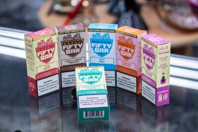 Experience the Fifty Bar Disposable Vape at One Stop Smoke Shop. Enjoy rich flavors, smooth hits, and up to 10,000 puffs for the ultimate vaping satisfaction.
