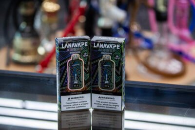 Lanavape Airship Disposable Vape in sleek packaging, offering premium flavors and extended battery life—available at One Stop Smoke Shop.
