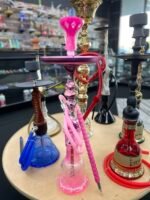 Pink designer hookah displayed at One Stop Smoke Shop Houston